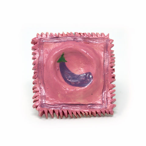 Colin J. Radcliffe, "Eggplant Emoji Condom"